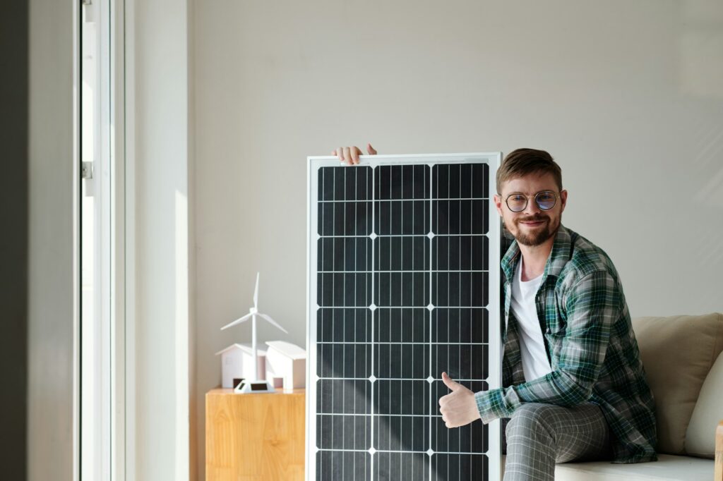 happy Man with Solar Panel in Hobart Tasmania